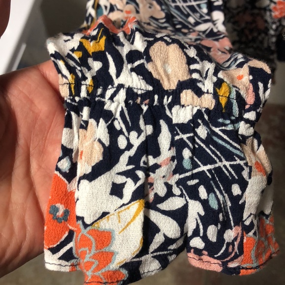 Floral Anthropologie top with buttons and tassel details - Picture 2 of 6
